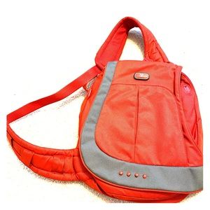 Tumi sling backpack red with grey accents